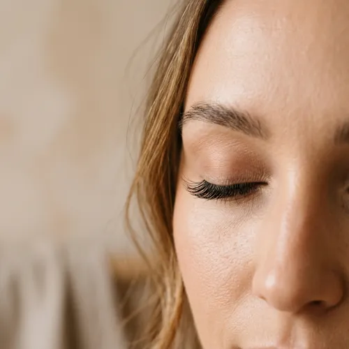 Close-up of a lifted and tinted natural lash line